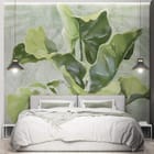 Miniatura fototapety Zielone liście na jasnym tle we wnętrzu sypialni