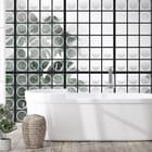 Miniatura fototapety Liście za szklaną ścianą we wnętrzu łazienki