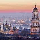 Miniatura fototapety Panorama miasta z wieżą i mostem