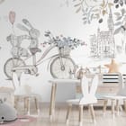 Miniatura fototapety Rower z pluszowymi królikami we wnętrzu pokoju dziecka