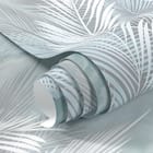 Miniatura fototapety Białe liście palmowe na szarym tle fragment #1