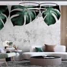 Miniatura fototapety Zielone liście monstery we wnętrzu salonu