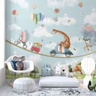 Miniatura fototapety Zwierzęta na linie nad miastem we wnętrzu pokoju dziecka
