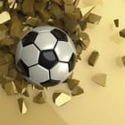 Miniatura fototapety Piłka nożna w złotych odłamkach