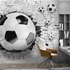 Miniatura fototapety Piłka Nożna i Rozbita Ściana we wnętrzu pokoju nastolatka