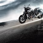 Miniatura fototapety Motocykl na pustej drodze