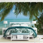 Miniatura fototapety Plaża z palmami i oceanem we wnętrzu sypialni