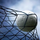 Miniatura fototapety Piłka nożna w siatce bramki