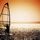 Miniatura fototapety Windsurfer o zachodzie słońca