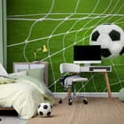 Miniatura fototapety Piłka nożna w siatce bramki we wnętrzu pokoju dziecka