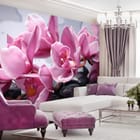 Miniatura fototapety Różowe orchidee na kamieniach we wnętrzu salonu