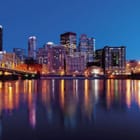 Miniatura fototapety Miasta nocą, wieżowce na tle nieba