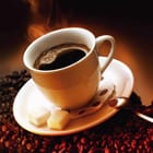 Miniatura fototapety Kawa z filiżanki na spodku