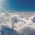 Miniatura fototapety Chmury na tle jasnego nieba