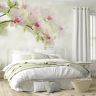 Miniatura fototapety Storczyki nad spokojną wodą we wnętrzu sypialni