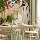 Miniatura fototapety Uliczka z łukiem i kwiatami we wnętrzu kuchni