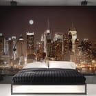 Miniatura fototapety Nocna panorama z wieżowcami we wnętrzu sypialni
