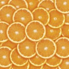 Miniatura fototapety Plasterki pomarańczy w soczystych kolorach