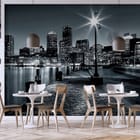 Miniatura fototapety Panorama miasta nocą z lampą we wnętrzu kawiarni