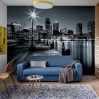 Miniatura fototapety Panorama miasta nocą z lampą we wnętrzu pokoju nastolatka