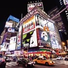 Miniatura fototapety Miasta nocą z neonowymi reklamami