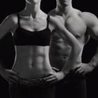 Miniatura fototapety Muskularne Sylwetki na Ciemnym Tle