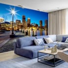 Miniatura fototapety Panorama miasta nocą nad wodą we wnętrzu salonu