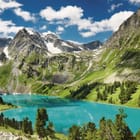 Miniatura fototapety Górskie jezioro w otoczeniu szczytów