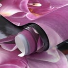 Miniatura fototapety Różowe orchidee na kamieniach - realne zdjęcie w rolce