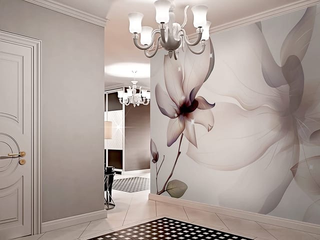 Fototapeta z dużym kwiatem magnolii na gałęzi z liśćmi i rozmytym tłem