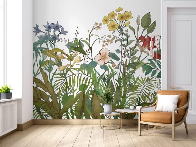 Fototapeta z kolorowymi kwiatami i zielonymi liśćmi na białym tle