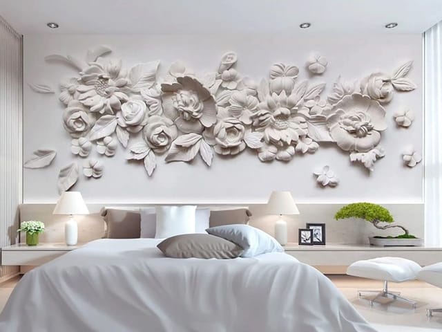 Fototapeta z dekoracyjnym reliefem kwiatowym i liśćmi w tle