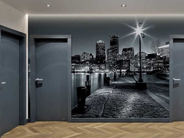 Fototapeta Panorama miasta nocą z lampą (mpn: 229) Fototapeta przedstawiająca nocną panoramę miasta z oświetlonymi budynkami i brukowaną ścieżką.