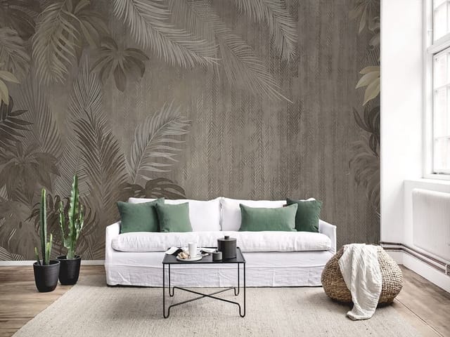 Fototapeta z dużymi liśćmi tropikalnych roślin na tle w odcieniach brązu i beżu