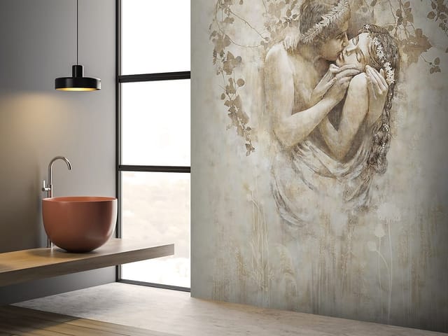 Fototapeta z parą ludzi w objęciach, otoczoną liśćmi na gałęziach.