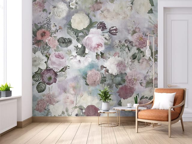 Fototapeta z pastelowymi kwiatami różu i bieli oraz zielonymi liśćmi