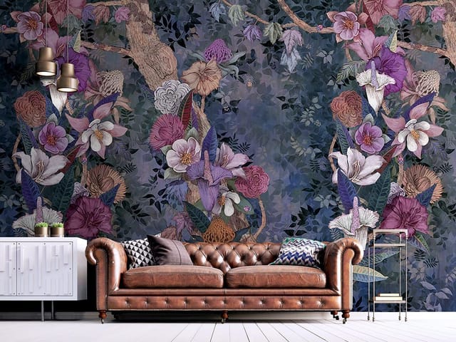 Fototapeta z różnorodnymi kwiatami na tle gałęzi drzewa i ciemnymi liśćmi