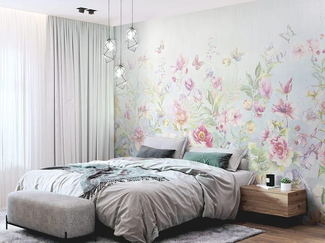 Fototapeta z kolorowymi kwiatami na łące i delikatnymi liśćmi w pastelowych barwach