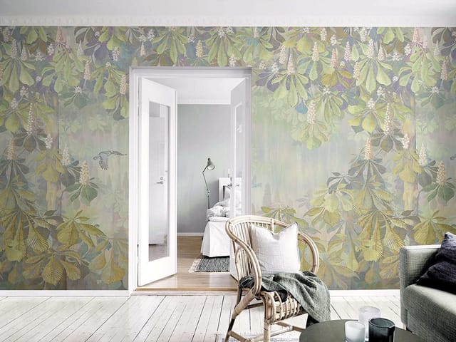 Fototapeta z liśćmi i kwiatami kasztanowca na rozmytym tle