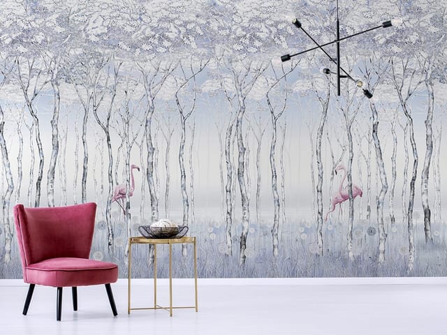 Fototapeta z różowymi flamingami w lesie z białymi liśćmi i niebieską trawą