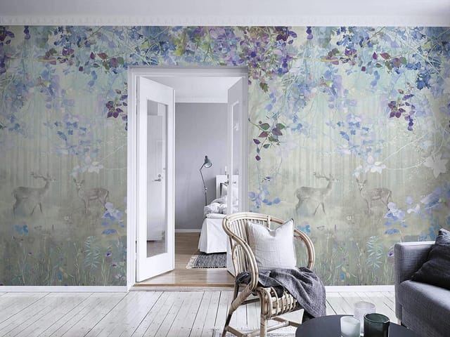 Fototapeta z gałęziami i fioletowymi kwiatami oraz jeleniami