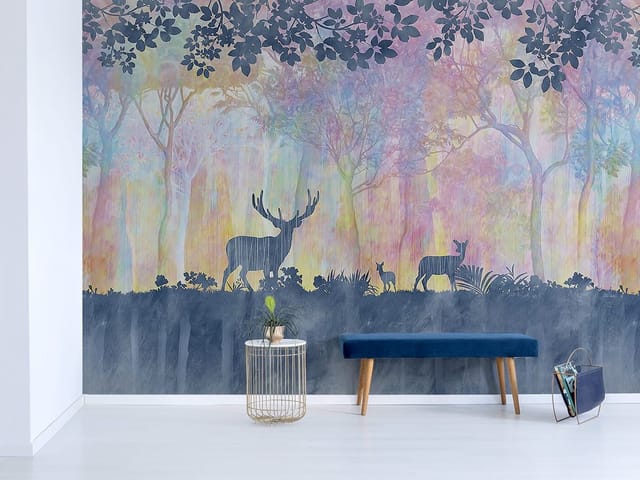 Fototapeta z sylwetkami jeleni w lesie z kolorowymi drzewami w tle