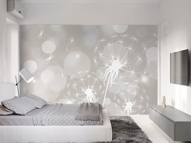 Fototapeta z białymi dmuchawcami na tle rozmytych świetlistych plam bokeh