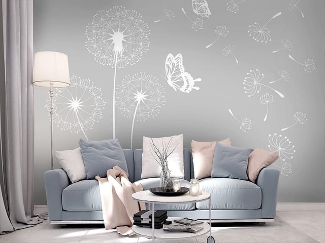 Fototapeta z białymi dmuchawcami na szarym tle i motylem