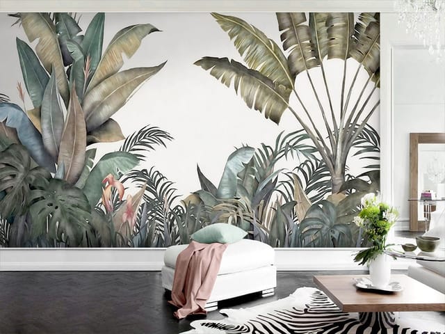 Fototapeta z dużymi tropikalnymi liśćmi bananowca na jasnym tle