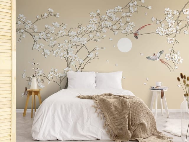 Fototapeta z gałęziami magnolii na tle księżyca i spadających płatków