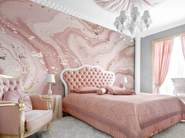 Fototapeta z abstrakcyjnymi różowymi wzorami i złotymi plamkami