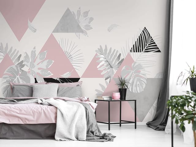 Fototapeta z geometrycznymi trójkątami i szarymi liśćmi na jasnym tle