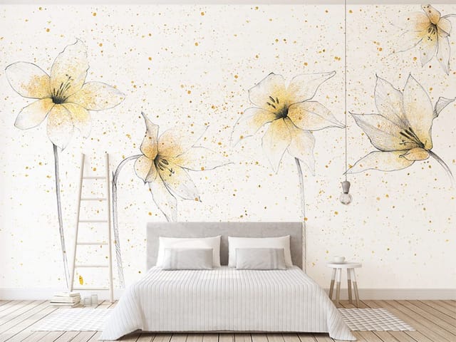 Fototapeta z delikatnymi liliami i złotymi plamkami na białym tle