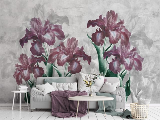 Fototapeta z fioletowymi irysami i zielonymi liśćmi na szarym tle
